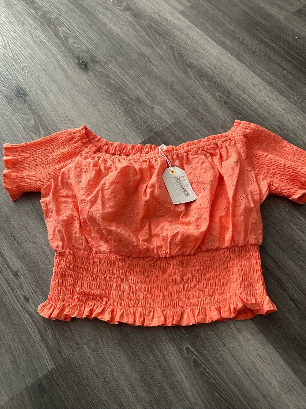 Smocked Off-Shoulder Eyelet Crop Top in Coral